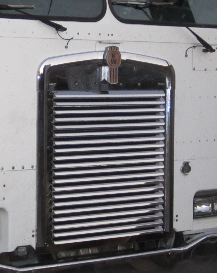 Kenworth K100E Cab Over Hood Grill - 20 Louvers - Grill Surround NOT included.