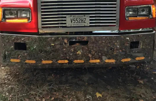 Bumper 20” Freightliner FLD 120/ FLD112 Chrome fits all years. Aerodyamic, Wrap around, rectangular fog light, center tow and 11 hidden light holes