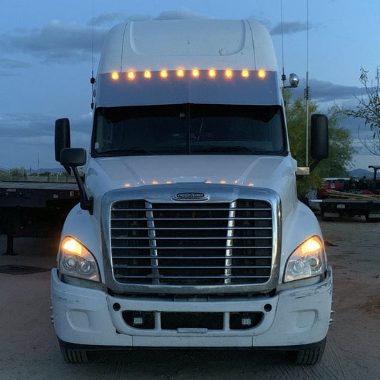 Visor 18" Freightliner Cascadia Condo / Mid Roof. Custom w/ (10) 2" light cut out Across the Top Evenly Spaced.